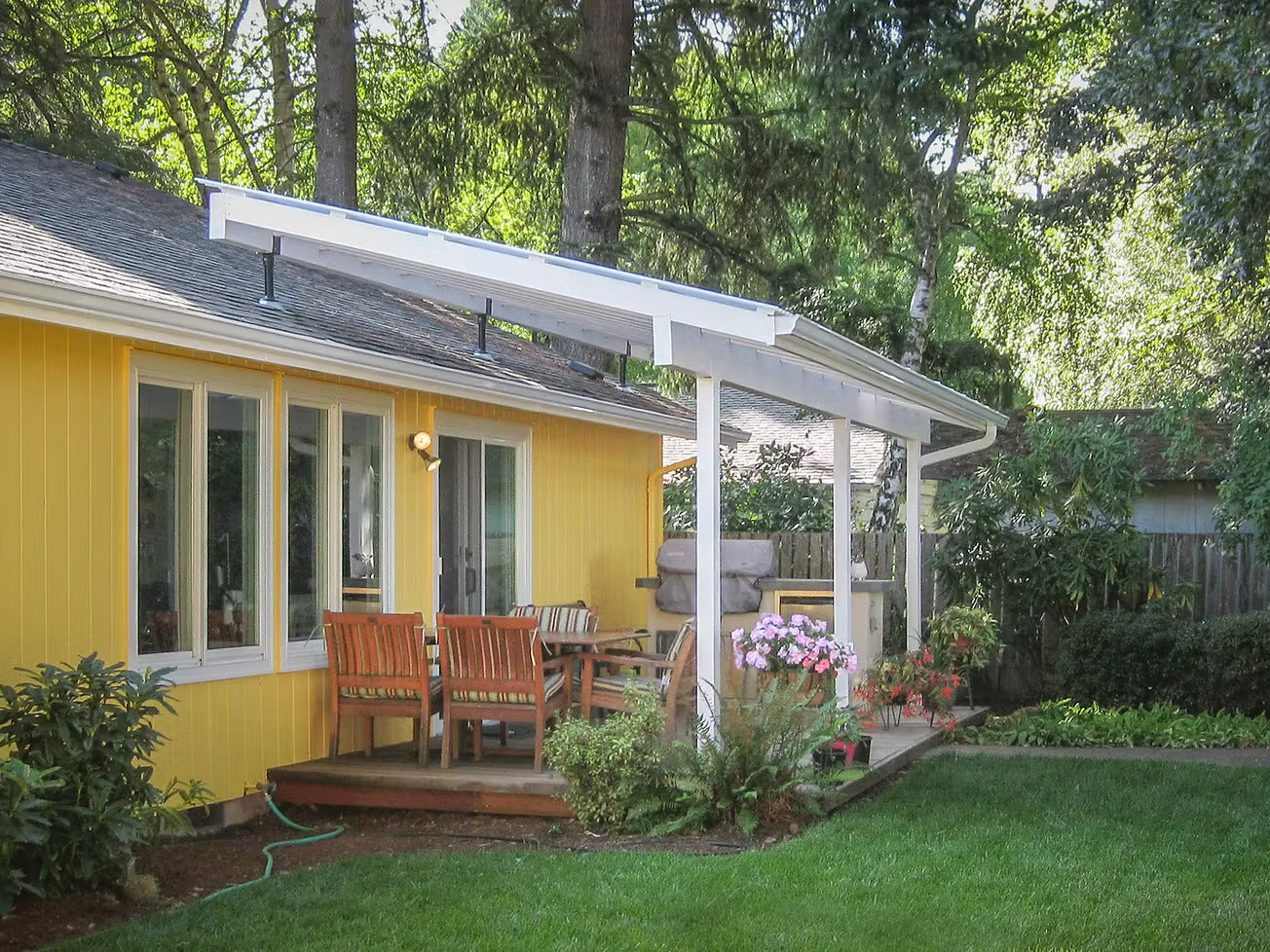 After SkyLift Hardware: elevated, bright patio cover with high ceilings