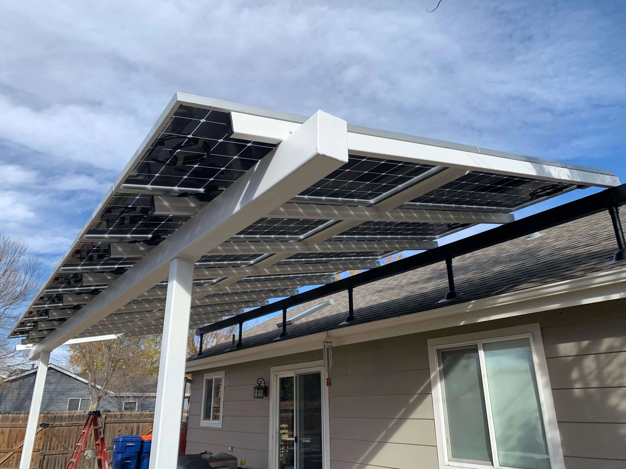 Patio cover raised above the roofline on SkyLift risers